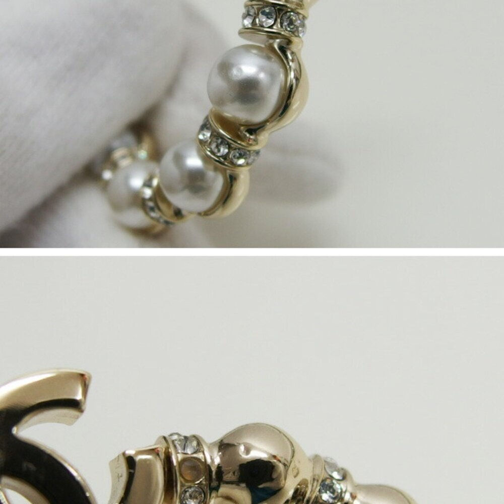 CHANEL Authentic White Pearl Logo Earrings - Picture 8 of 11